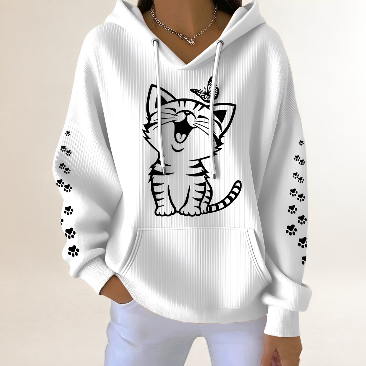 Women's hoodie with cat graphic and paw-print sleeves, drawstring hood, kangaroo pocket, relaxed fit