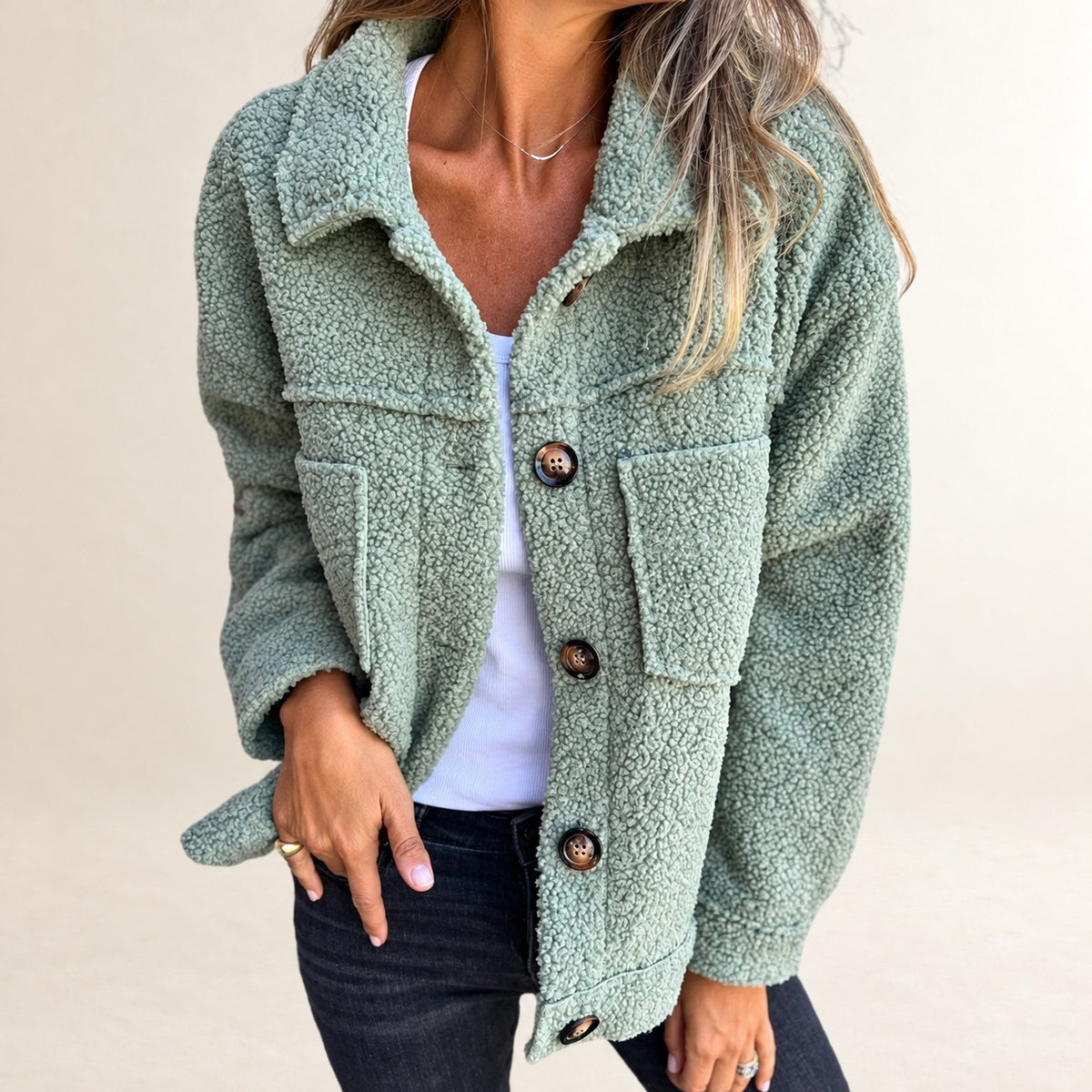 Women's short button-front textured jacket with lapel collar and patch pockets, relaxed fit